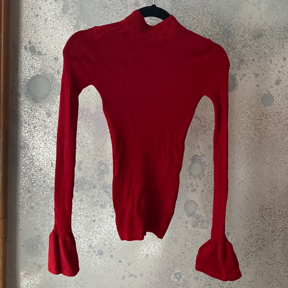 Khaite red knitted top with bell sleeves